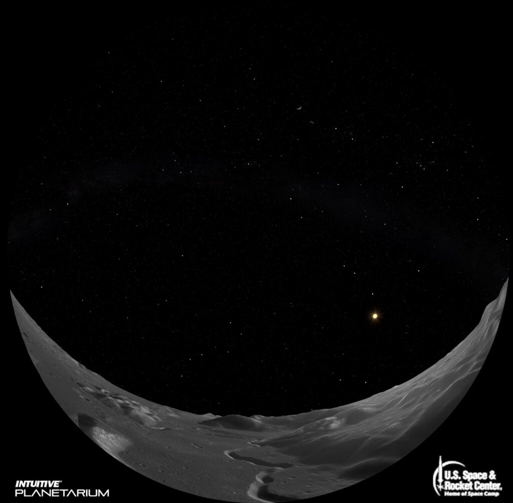 Fulldome still: a star field above a lunar horizon